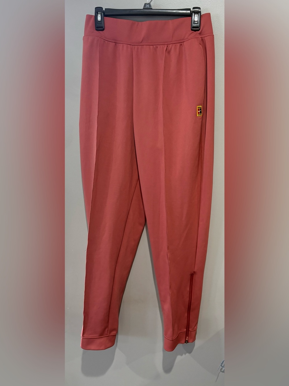 NikeCourt Heritage Men's Slim Fit Dri-FIT Tennis Track Pants Pink L